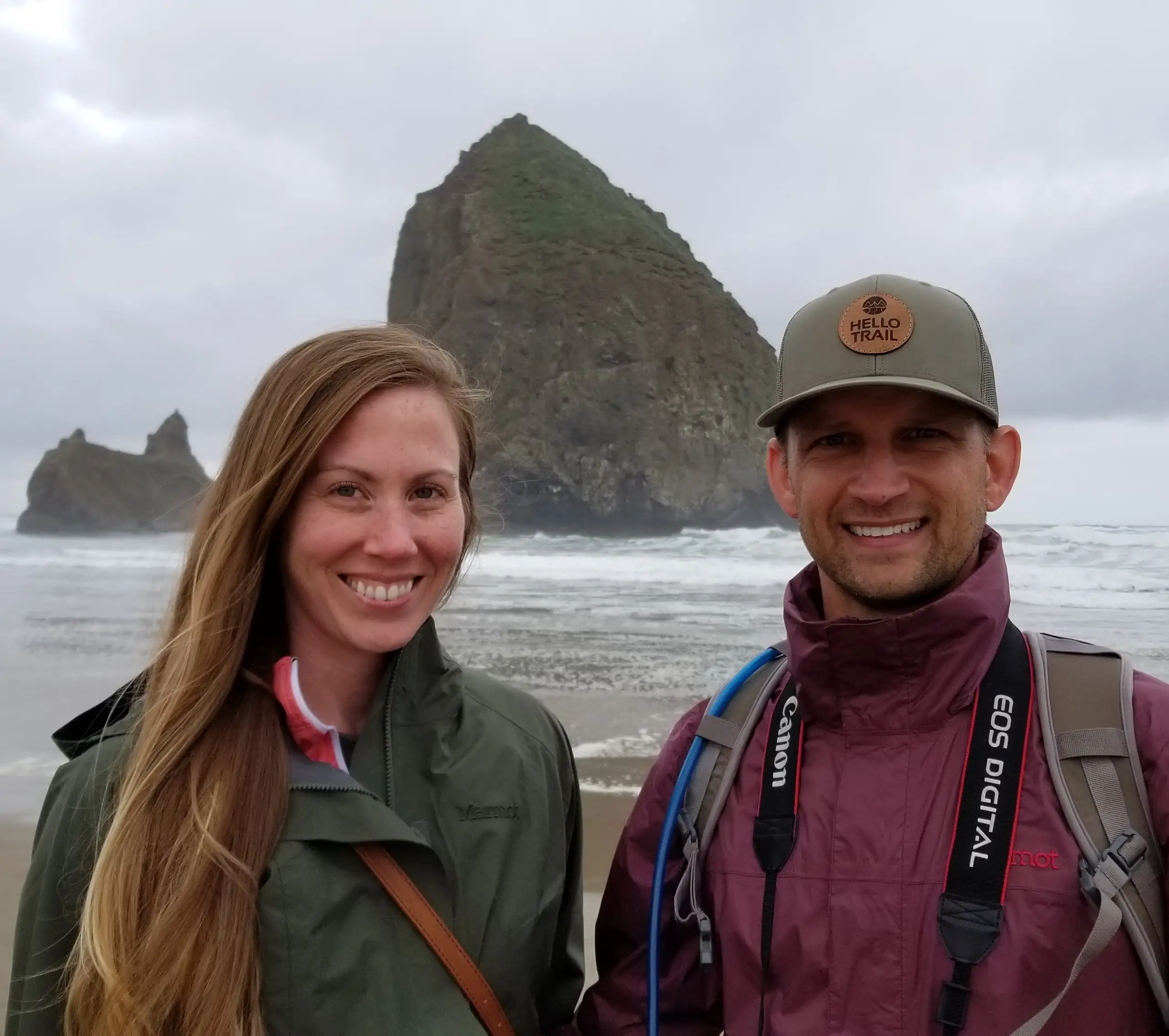 Ashley and Andrew Tepen on the shore at Cannon Beach, Oregon